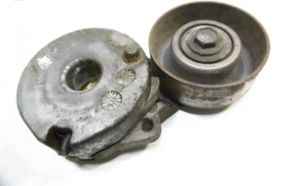 Renault Megane III Belt tensioner pulley 