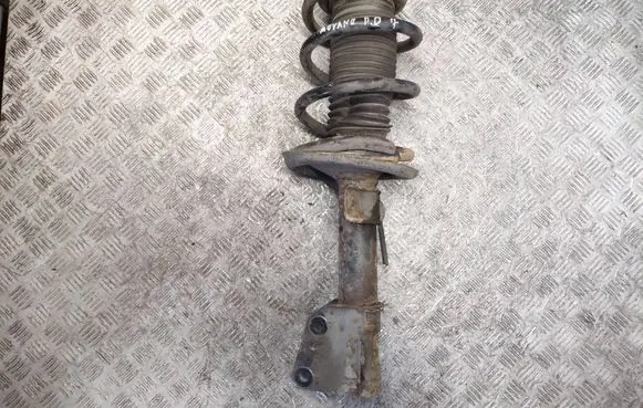 Opel Movano B Front shock absorber with coil spring