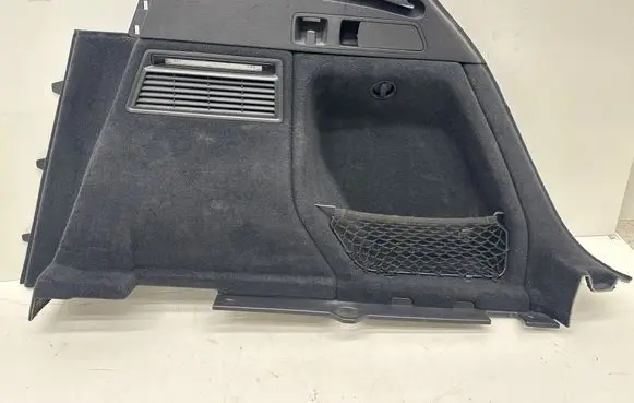 Trunk/boot lower side trim panel
