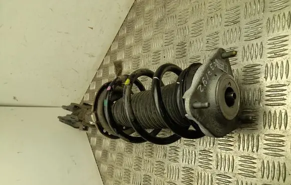 Renault Logan I Front shock absorber with coil spring 54650CV300