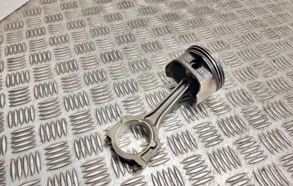 Piston with connecting rod