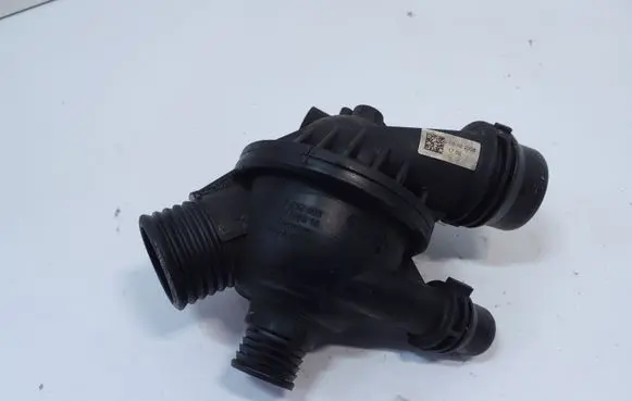 Thermostat/thermostat housing
