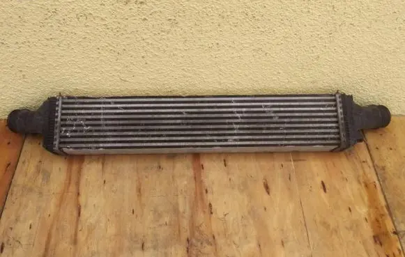 Porsche Macan (95B) Intercooler radiator 8K0145805E