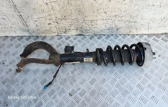 Front shock absorber with coil spring