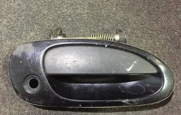 Mazda 323 F Front door exterior handle
