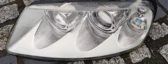Volkswagen Touareg I Headlight/headlamp 7L6941015BN
