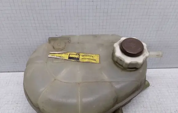 Opel Movano A Coolant expansion tank/reservoir 7700838740