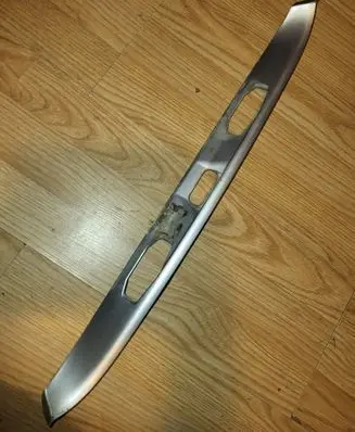 Trunk door license plate light bar