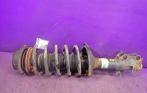 Volkswagen Golf III Front shock absorber with coil spring