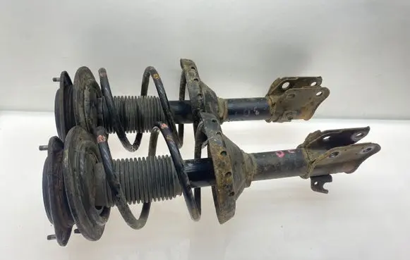 Subaru Legacy Front shock absorber with coil spring