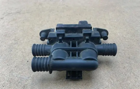 Coolant heater control valve
