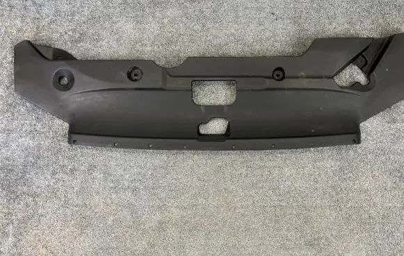 Engine bonnet/hood lock trim molding