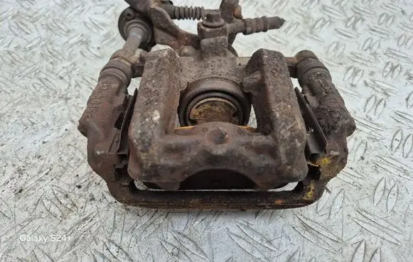 Opel Astra J Rear brake caliper 13345064