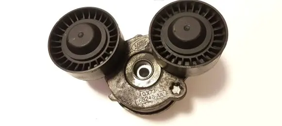 Jaguar XE Generator/alternator belt tensioner GX736B248AA