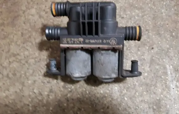 Coolant heater control valve
