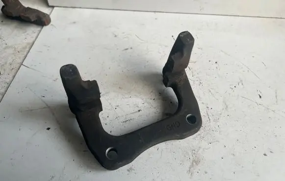 Volkswagen Golf V Brake caliper pad carrier rear 1K0615425P