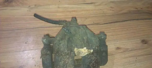 Hyundai Coupe Front brake caliper