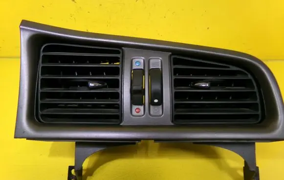 Nissan Primera Dash center air vent grill 687512F900