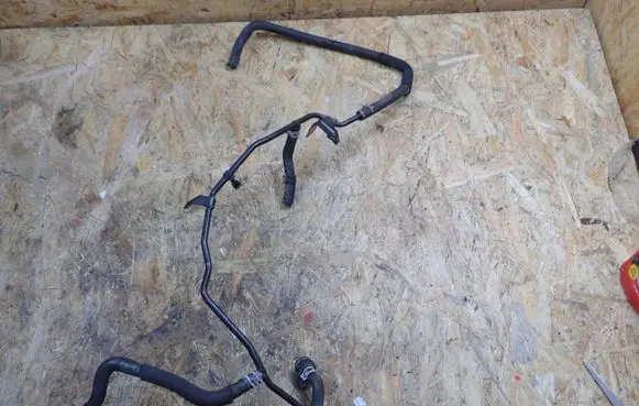 Skoda Octavia Mk3 (5E) Engine coolant pipe/hose 06K121075BF
