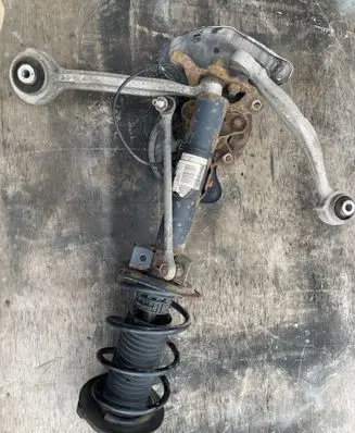 Front wheel hub spindle knuckle