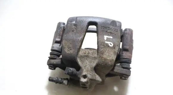 Opel Corsa D Front brake caliper 