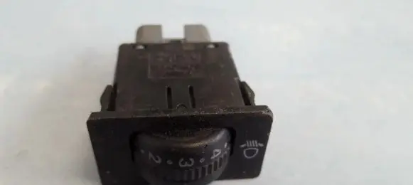 Headlight level height control switch