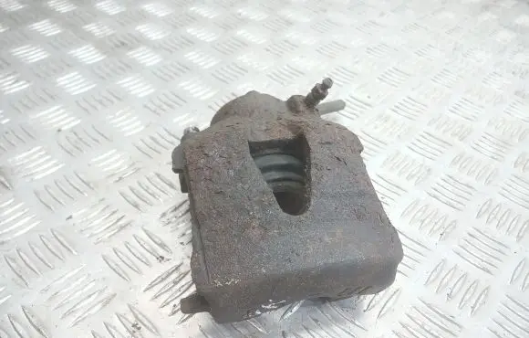 Volkswagen Golf IV Front brake caliper