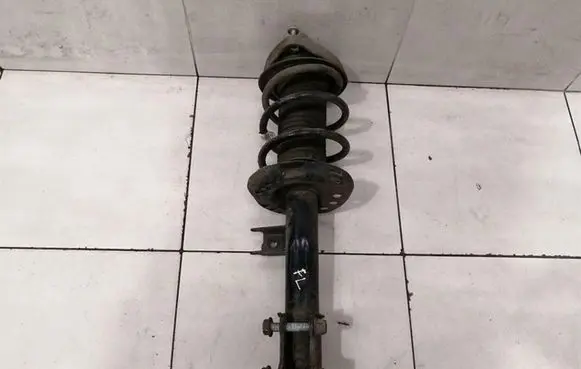 Mercedes-Benz GLA W156 Front shock absorber with coil spring A1563231900