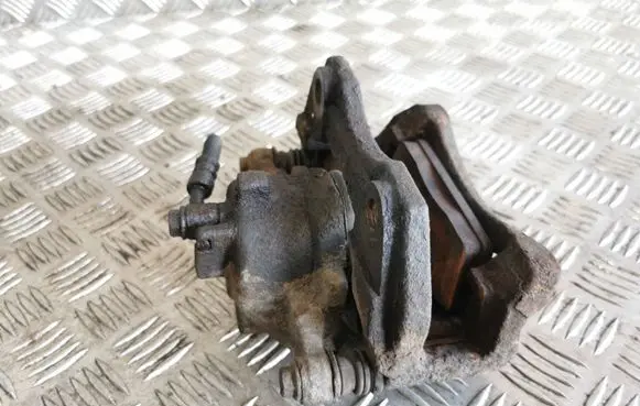 Nissan Almera N16 Front brake caliper