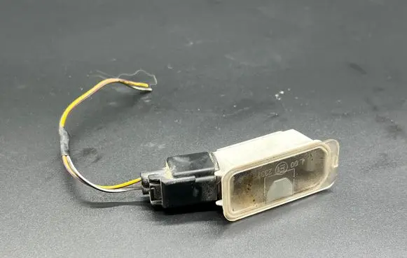 Ford Mondeo MK IV Number plate light 7S7113550AB 0800A4639 104062010