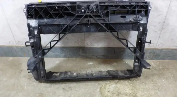 Radiator support slam panel