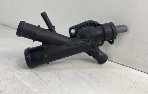 Volkswagen Golf VI Engine coolant pipe/hose 03L121131AA