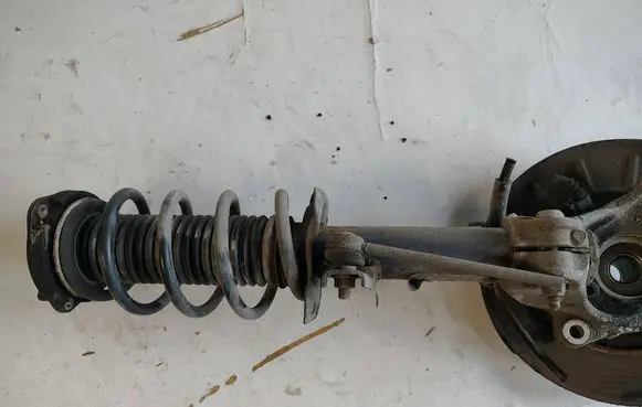 Volkswagen PASSAT B7 Front shock absorber with coil spring 