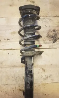 Volkswagen Caddy Front shock absorber with coil spring 1T0413031HQ