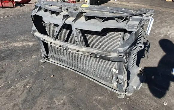 Radiator support slam panel