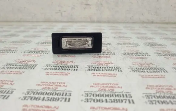 Volkswagen PASSAT B6 Number plate light 8T0943021