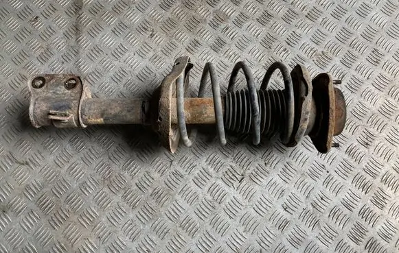 Subaru Forester SG Front shock absorber with coil spring