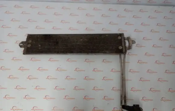 Volkswagen Touareg I Engine oil radiator 7L0317019 7L0317821