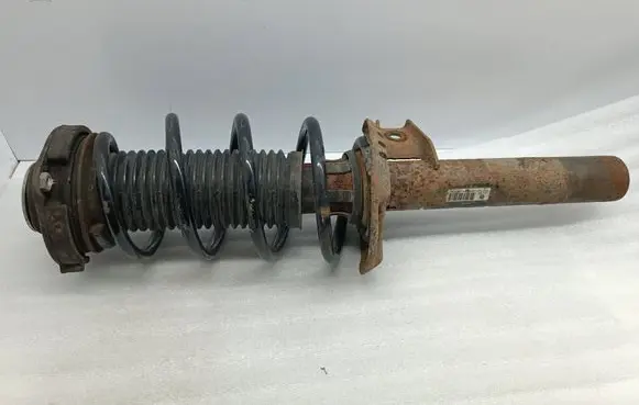 Skoda Octavia Mk2 (1Z) Front shock absorber with coil spring 1K0413031BF