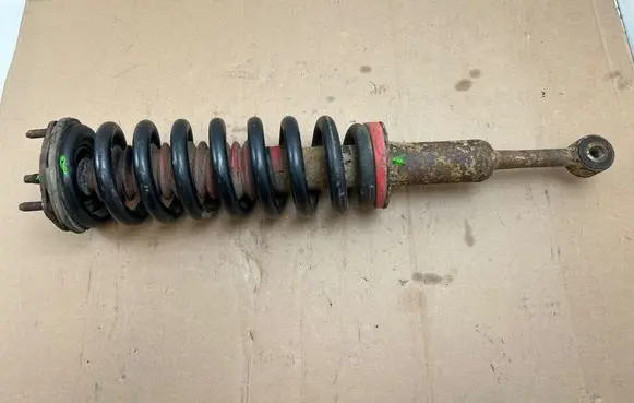 Toyota Tundra II Front shock absorber with coil spring 