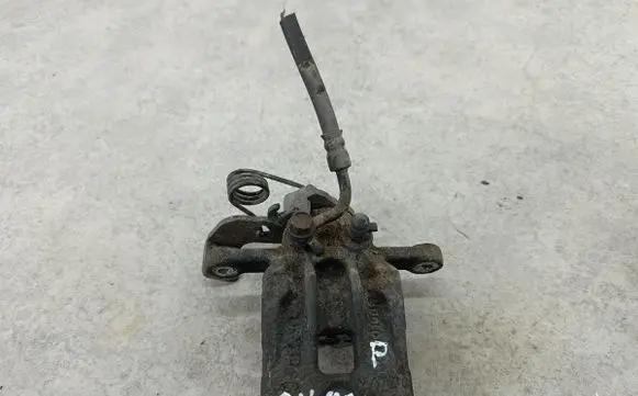 KIA Carens III Rear brake caliper 