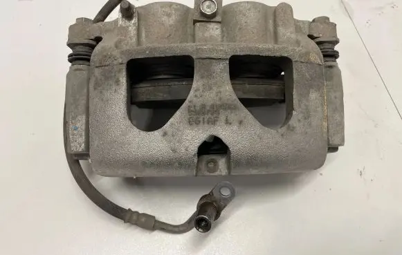 Dodge RAM Front brake caliper A0020688
