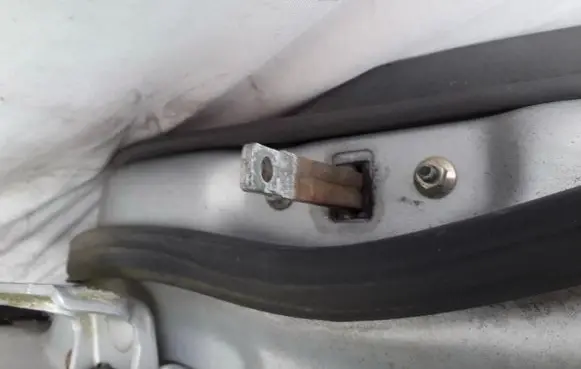 Mazda 626 Rear door check strap stopper