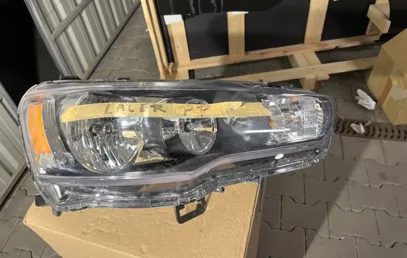 Mitsubishi Lancer VIII Headlight/headlamp 8301C338