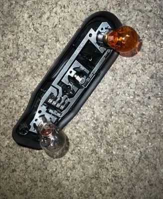 BMW 5 E39 Tail light bulb cover holder 2496339