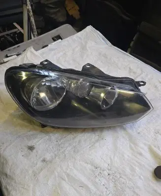Volkswagen Golf VI Headlight/headlamp 09558574