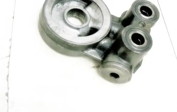 Renault Laguna I Oil filter mounting bracket 7416100702