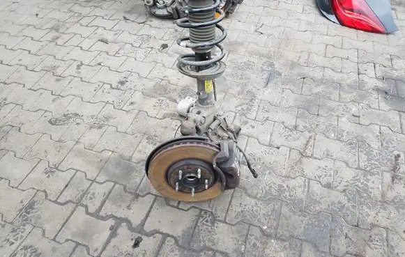Opel Zafira C Front wheel hub spindle knuckle 13427147