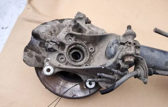 Front wheel hub spindle knuckle