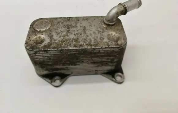 Audi A6 S6 C6 4F Engine oil radiator 06D117021C